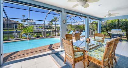 Charming and cozy with a dock for your boat and minutes to the Beach