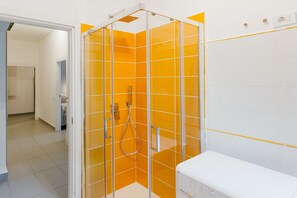 Shower, bidet, towels, soap