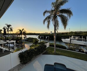 Terrace/patio - Beautiful waterfront home. 8 min walk to the beach and restaurants private pool. (Indian Rocks Beach)