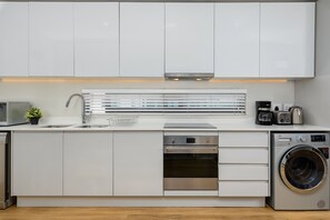 Fridge, microwave, oven, stovetop - Century City Apartment With Table Mountain Views (Cape Town)
