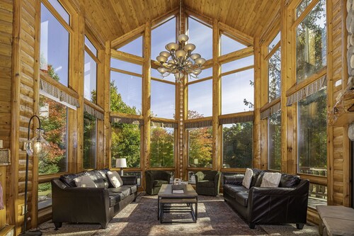 Lakefront secluded mult-family retreat with game room and two cabins. 