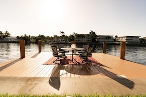 Enjoy dining or socializing on this deck overlooking the marina.