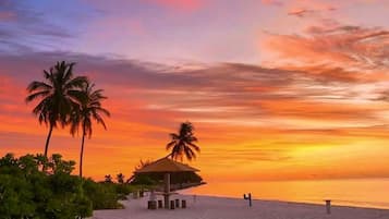 Beach nearby, white sand, free beach shuttle, snorkelling