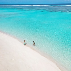 Beach nearby, white sand, free beach shuttle, snorkeling