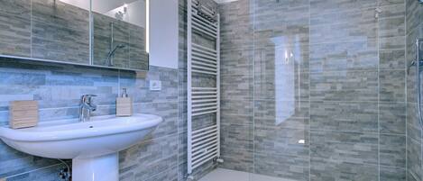 Hair dryer, bidet, towels, soap