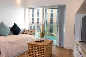 Lejlighed - 1 queensize-seng med sovesofa | Stue | 30-tommers tv med kabelkanaler