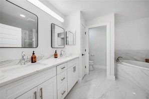 Bathtub, hair dryer, towels