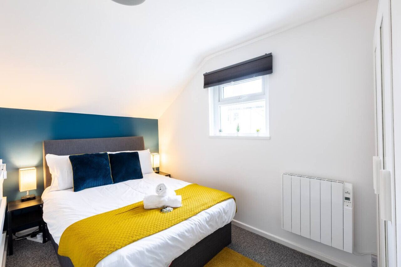 1 bedroom, desk, iron/ironing board, travel crib