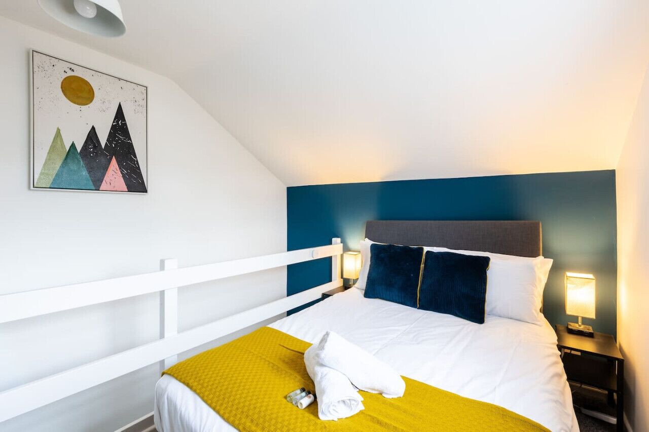 1 bedroom, desk, iron/ironing board, travel crib