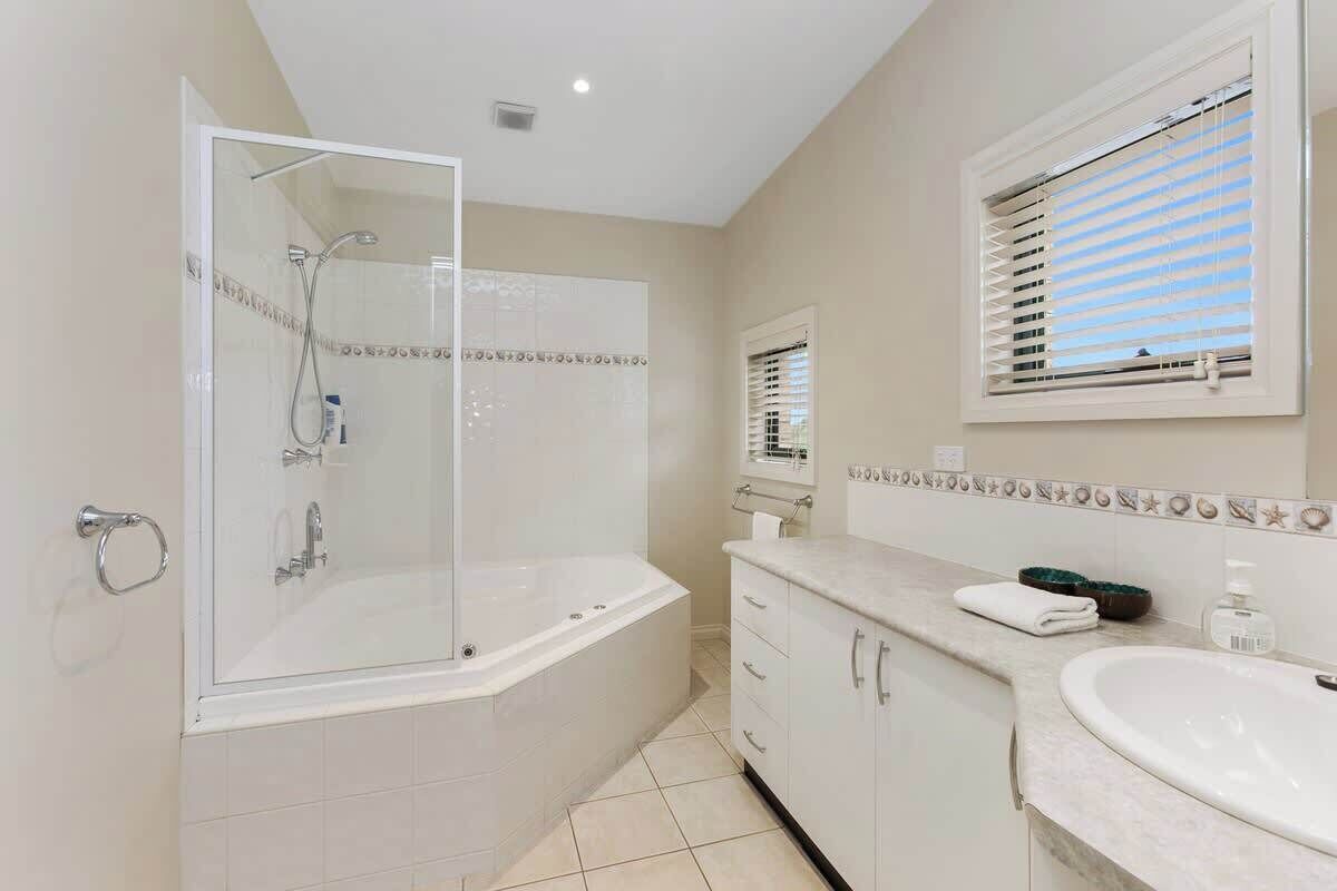 Shower, hair dryer, towels, shampoo