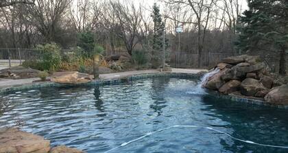 Beautiful 10 acre wooded estate with 4 bedrooms, 4 1/2 baths & private pool.