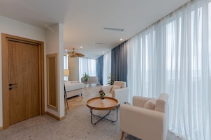Junior Double Room | Premium bedding, minibar, in-room safe, individually decorated