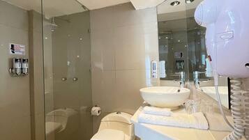 Shower, free toiletries, hair dryer, towels