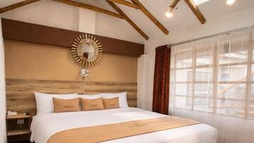 Ropa de cama hipoalergénica y tabla de planchar con plancha