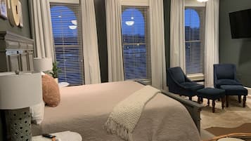 1 habitación, tabla de planchar con plancha y cuna de viaje