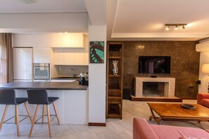 Exclusive Apartment | Living area | 52-inch Smart TV with digital channels, TV, Netflix