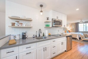 Microwave, coffee/tea maker, cookware/dishes/utensils