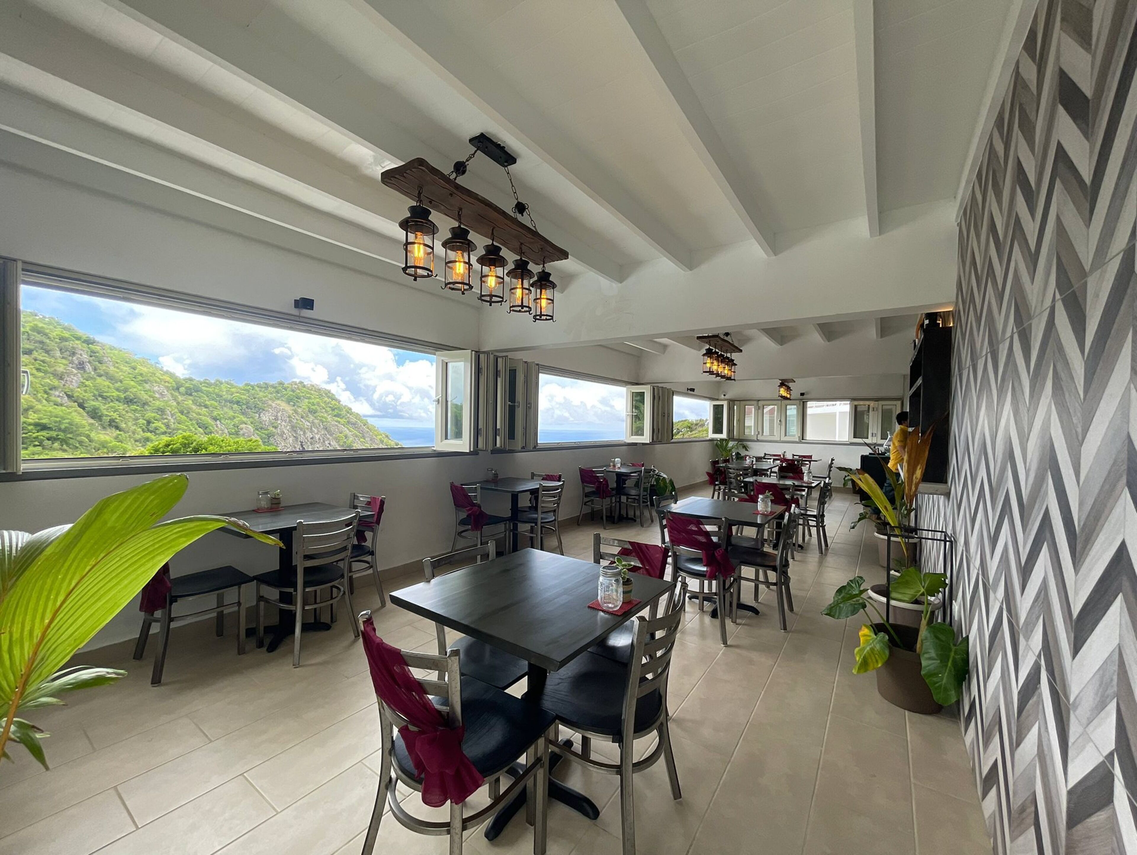 Breakfast, lunch, dinner served; Caribbean cuisine, pool views 