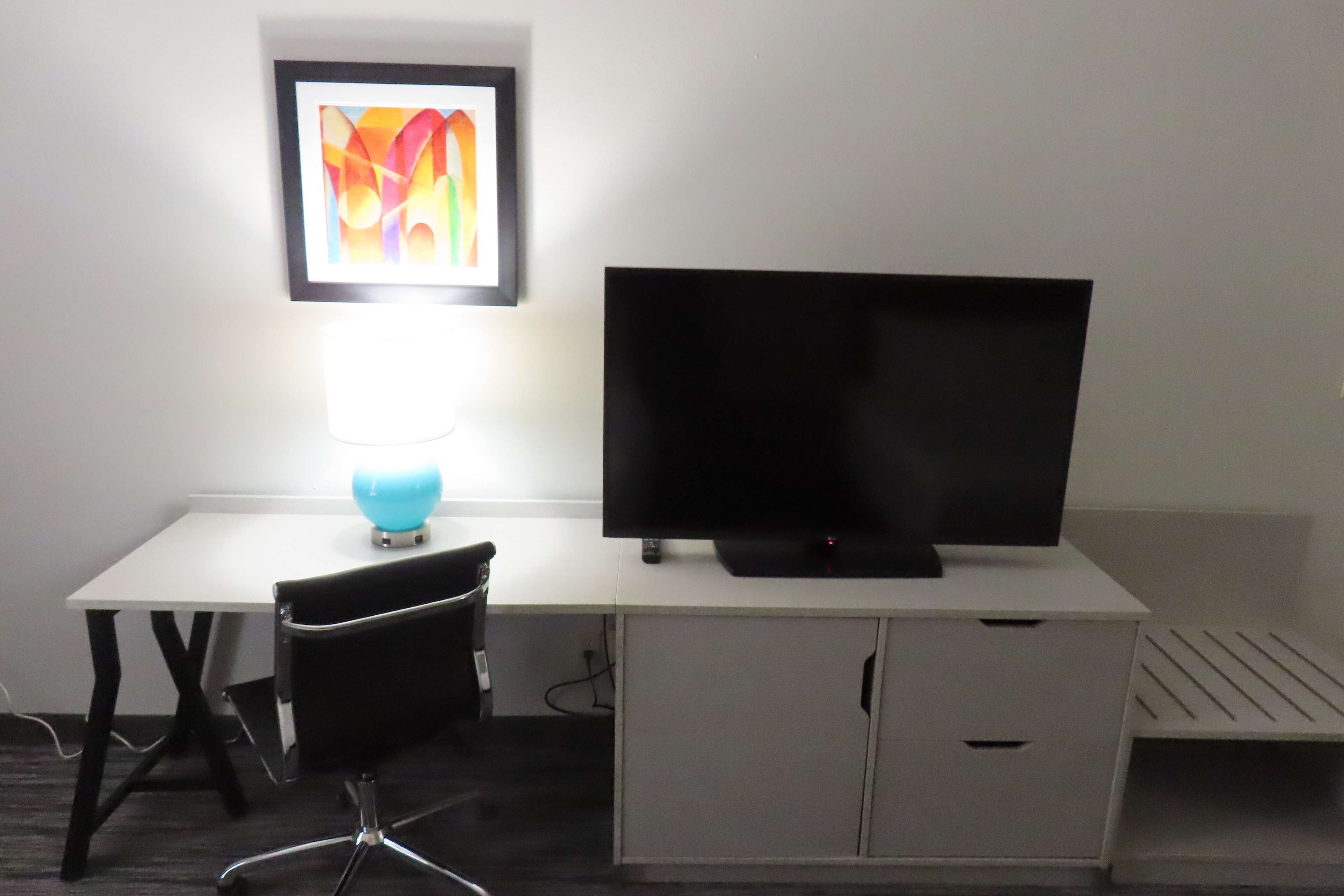 premium bedding, down duvets, desk, laptop workspace