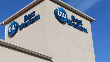 A building with signage reading "Best Western" and "BW" indicating the hotel chain.