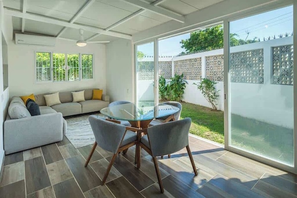 Steps from the kitchen, perfect for family breakfasts or cocktail nights.