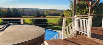 Private Finger Lakes Getaway with a Pool, Hot Tub, and Sauna, timber frame porch