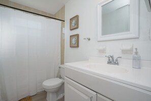 Bathtub, hair dryer, towels