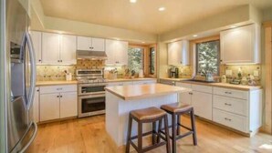 Cabin, 5 Bedrooms | Private kitchen - Idlewood Oasis by Tahoe Mountain Properties (Tahoe Vista)