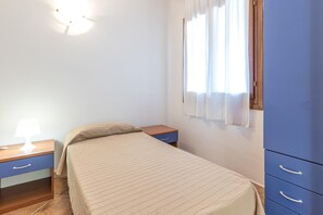 Apartemen Keluarga, beberapa kamar, 2 kamar mandi (Le Dimore di Nettuno 1 With Pool) | 2 kamar tidur, ruang kerja ramah laptop, dan setrika/meja setrika