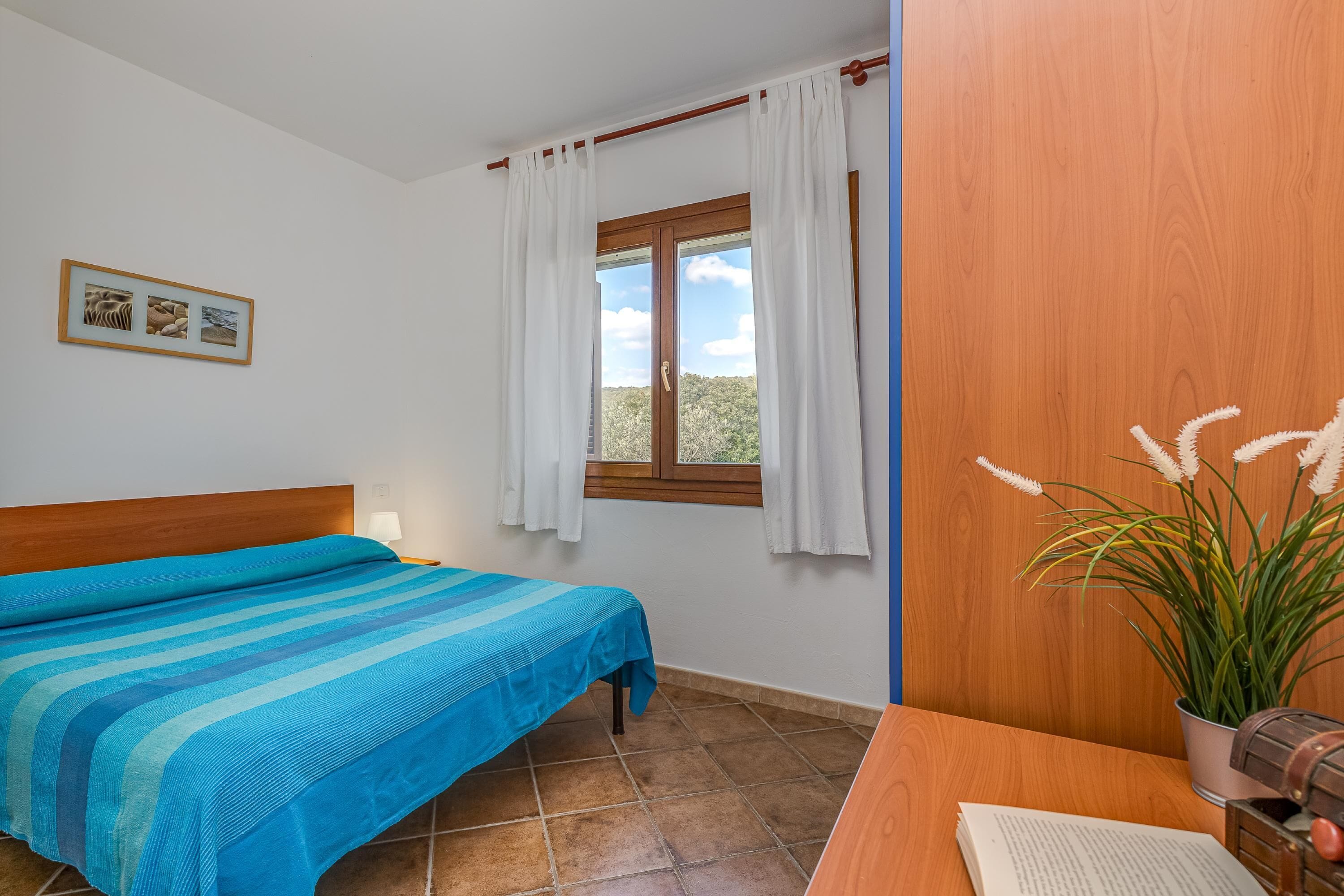 Apartamento família, vários quartos, 2 banheiros (Le Dimore di Nettuno 2 With Pool) | 2 quartos, espaço de trabalho para notebook