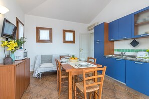 Familienapartment, 2 Schlafzimmer, 2 Bäder (Le Dimore di Nettuno 5 With Pool) | Speisen