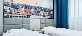 7 xing Ge Business Hotel