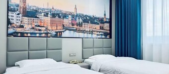 7 xing Ge Business Hotel