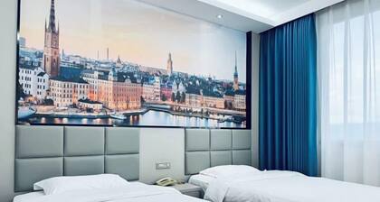 7 xing Ge Business Hotel