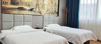 7 xing Ge Business Hotel