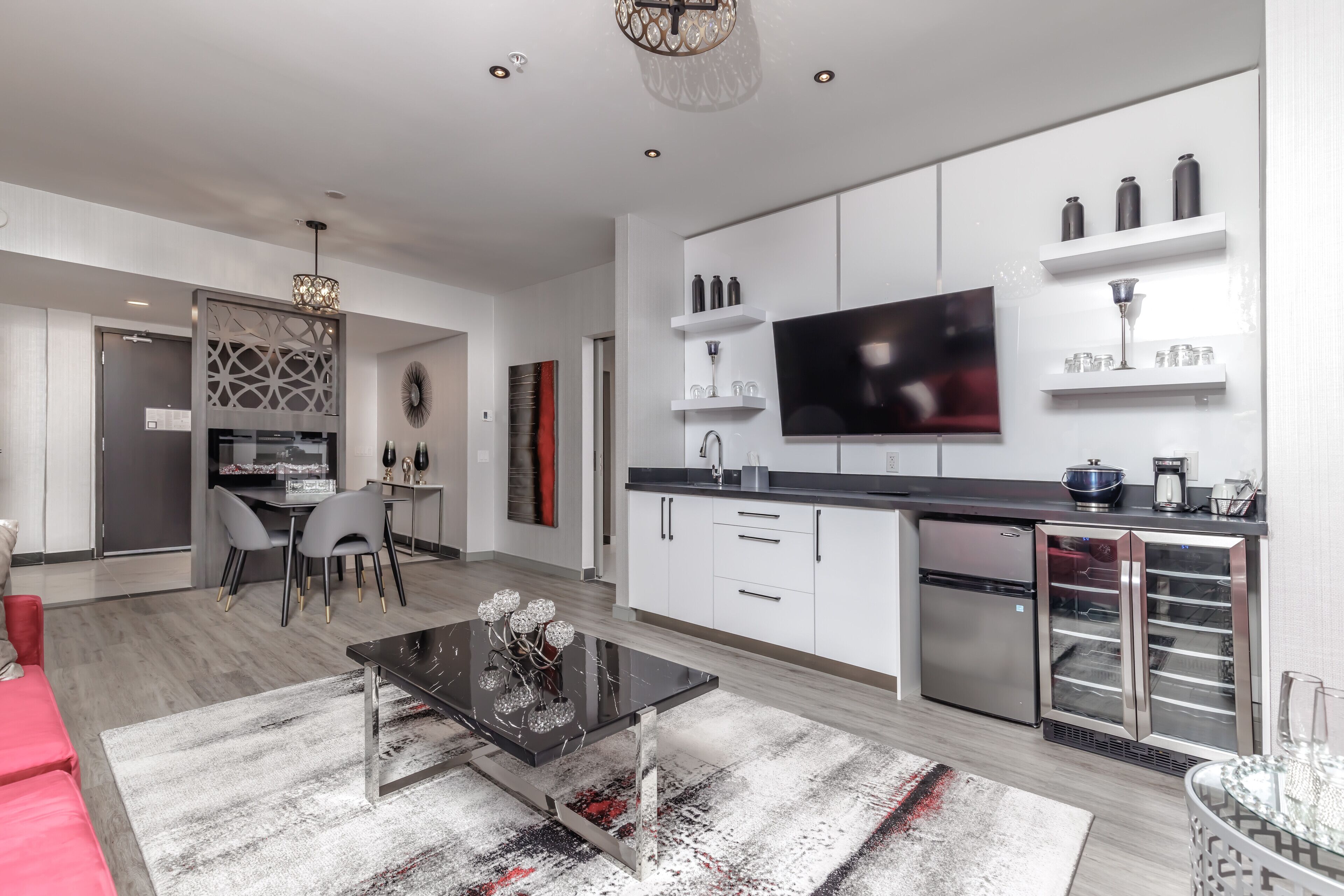 suite, 1 king bed with sofa bed (specialty) | living area | 55-inch flat-screen tv with cable channels, tv