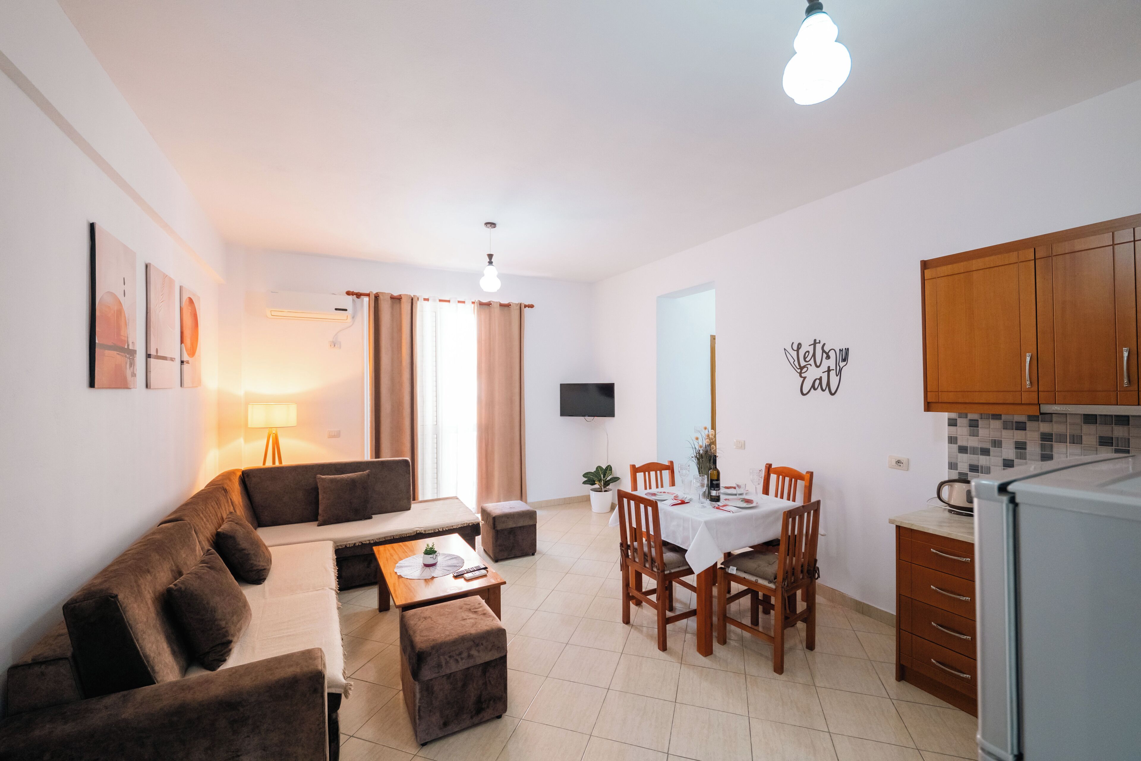 Apartment, 1 Bedroom, Balcony | Living area | 32-inch flat-screen TV with cable channels