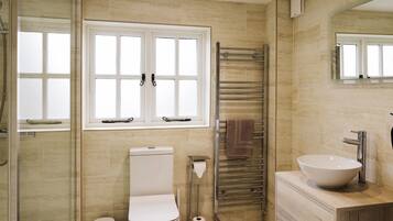 Bathtub, hair dryer, towels, soap