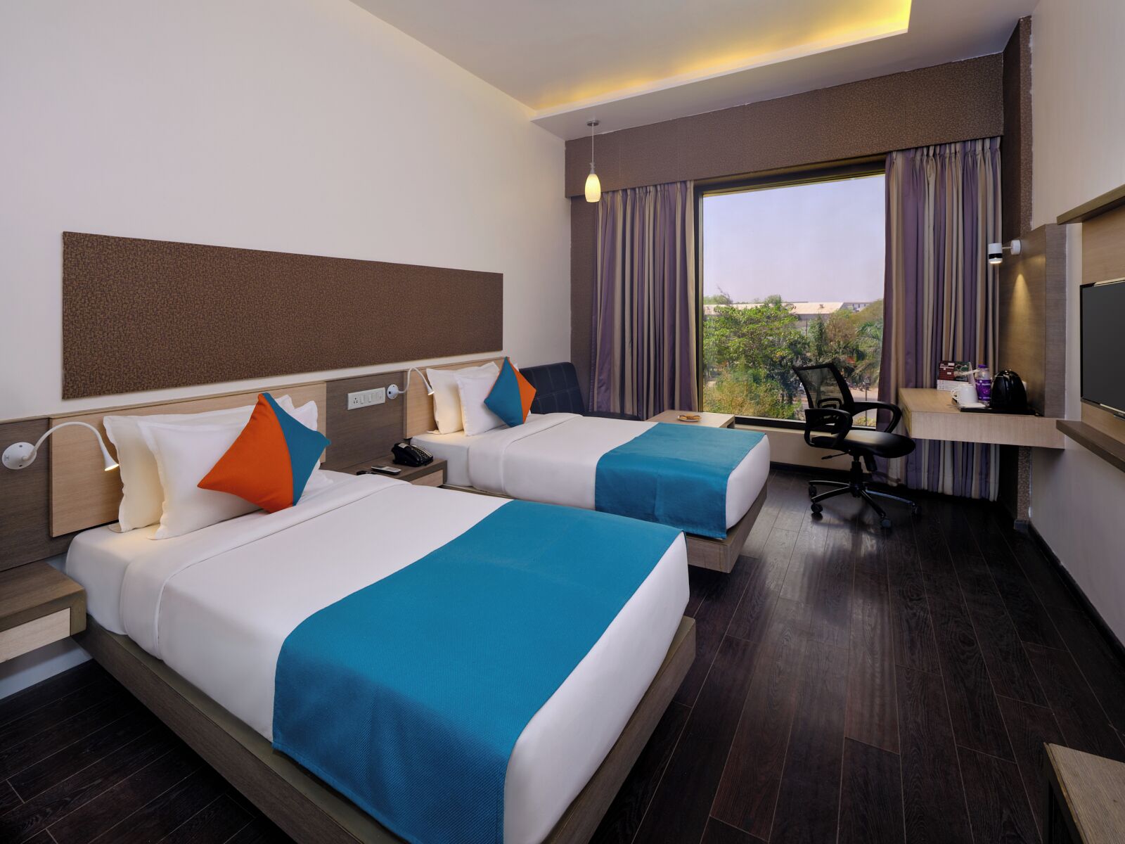 ห้องดีลักซ์ | เครื่องนอนระดับพรีเมียม, มินิบาร์, ตู้นิรภัยในห้องพัก