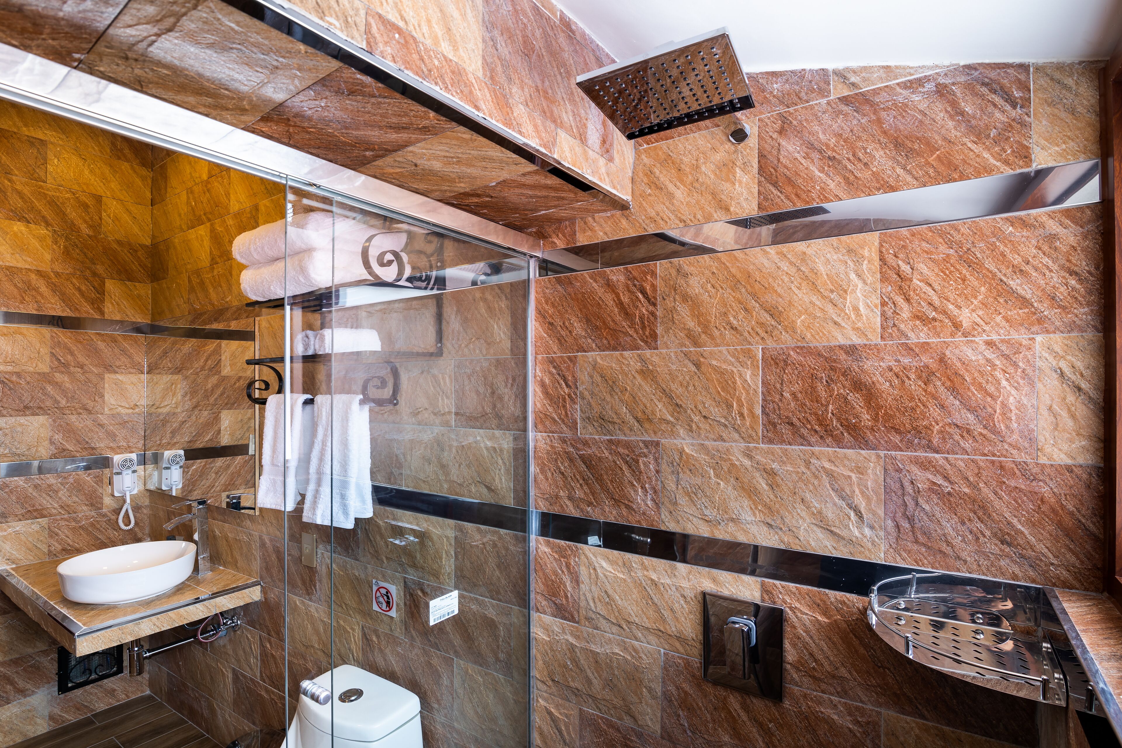 shower, rainfall showerhead, hair dryer, towels