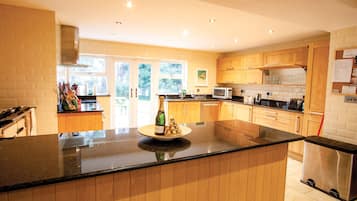 Traditional House | Private kitchen | Fridge, microwave, oven, stovetop