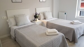 3 habitaciones, tabla de planchar con plancha y wifi gratis 