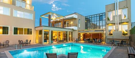 Seasonal outdoor pool, open 10:30 AM to 7:00 PM, sun loungers