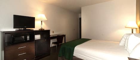 Tabla de planchar con plancha, wifi gratis y ropa de cama