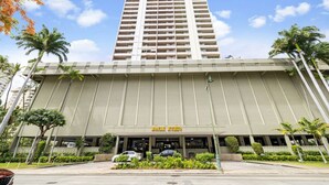A tall hotel with a prominent sign reading "ROYAL KURIO".