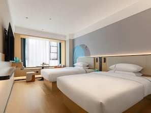 A hotel room with two beds, a desk, a TV, and a large window. - City Comfort Inn Chenzhou Dongjianghu (Chenzhou)