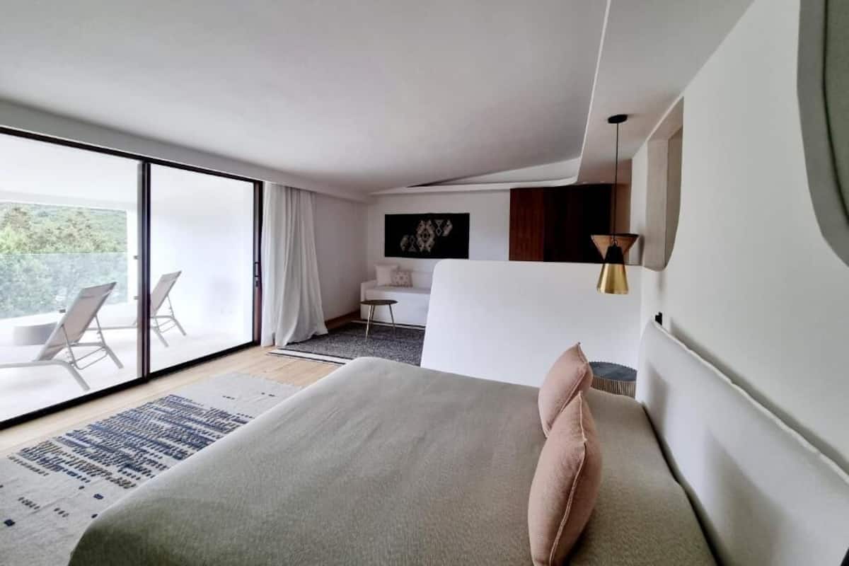 Junior Suite Deluxe | Ropa de cama de alta calidad y minibar