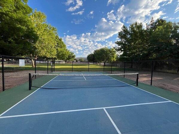 Amenities: Pickle Ball Court, Basketball Half-Court, Pavilion with grill, and Playground.