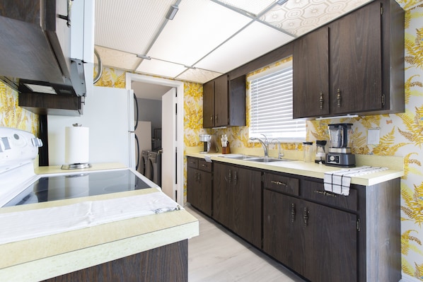 Fridge, microwave, stovetop, coffee/tea maker