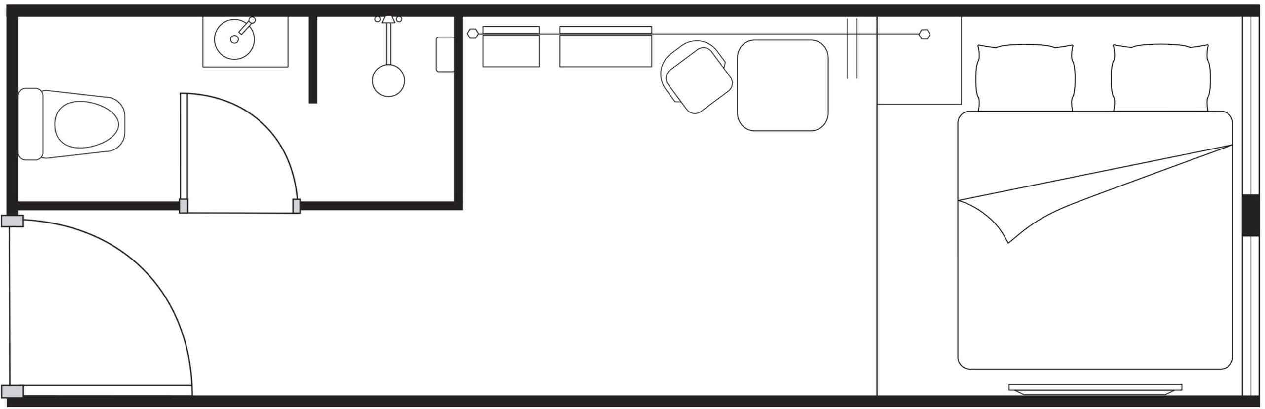 A floor plan with a kitchen, dining area, and a large bed.